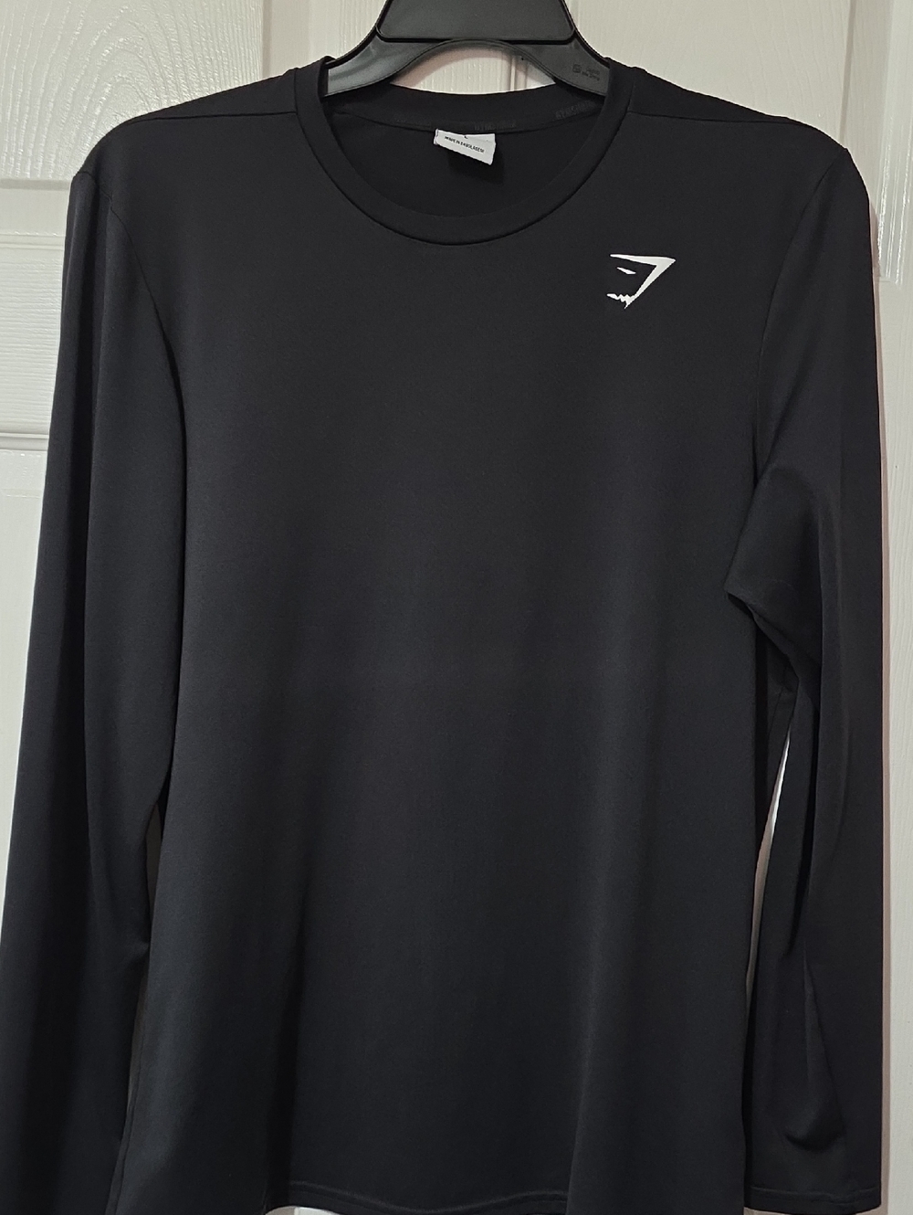 Gymshark Black Long-Sleeve Athletic Top with White Logo